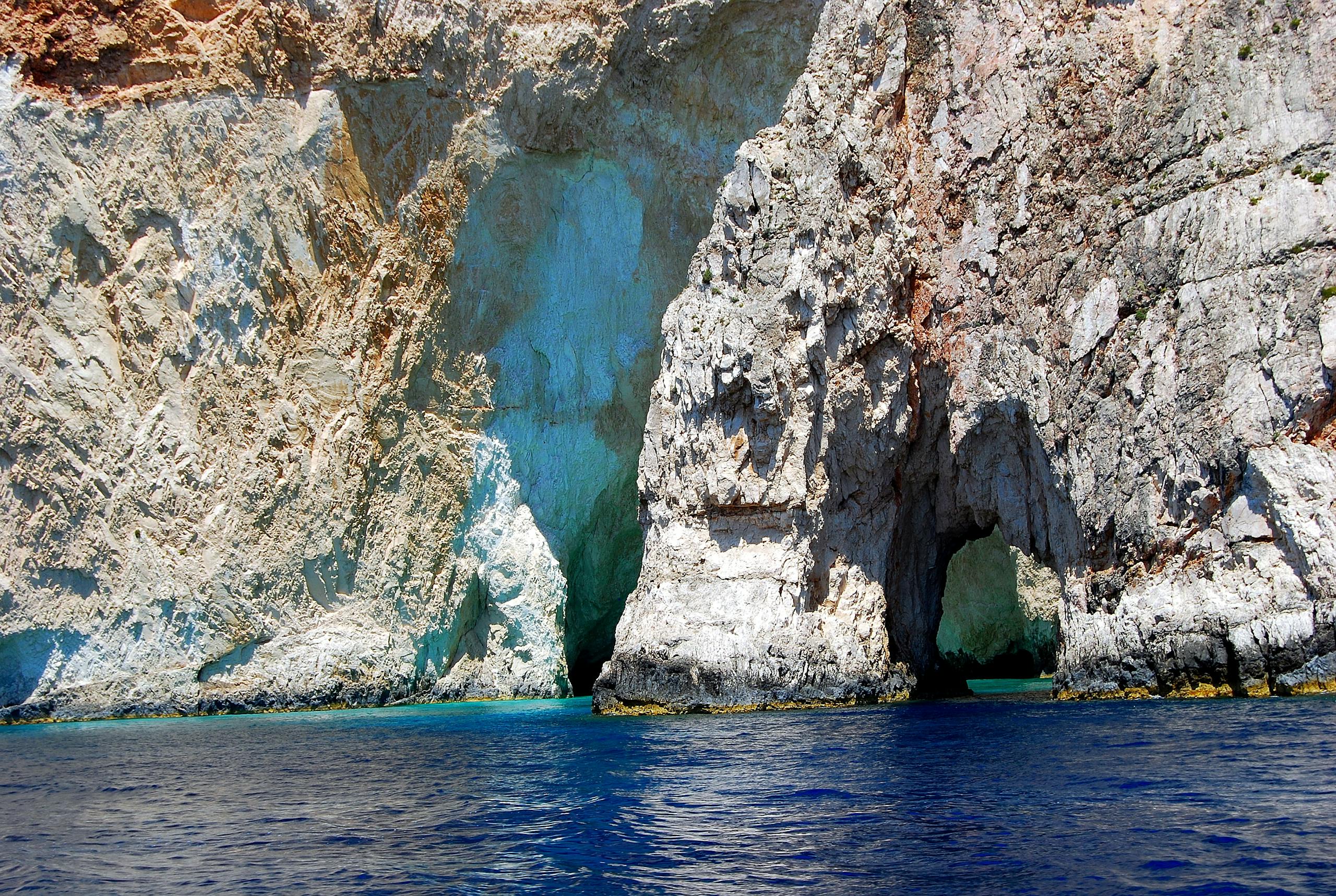 Explore these breathtaking limestone sea caves with crystal-clear blue waters.